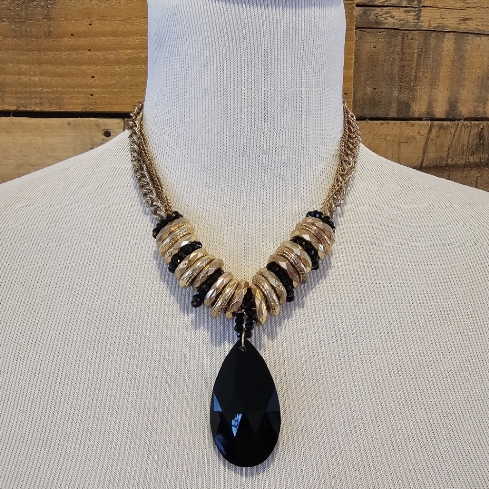 Statement Necklace w.Goldtone Multi strand Chain, Rings & Black Teardrop Pendant